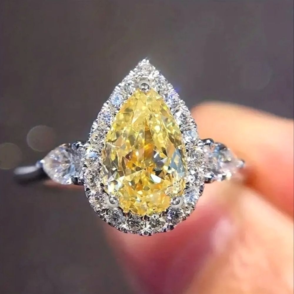 Ladies Timeless Elegant  Tear Drop Simulated Diamonds ring